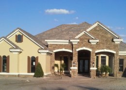 Custom home with stone veneer, stucco and foam accents - Lake Nona, Florida