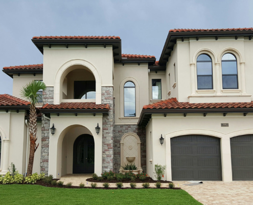Custom home with stucco, stone veneer, precast, and foam - Reunion, Florida
