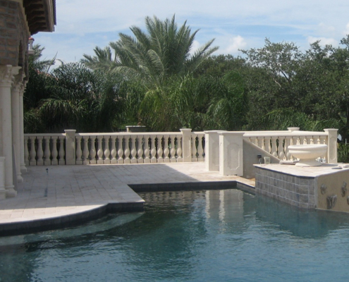 Cast stone balusters and custom pool