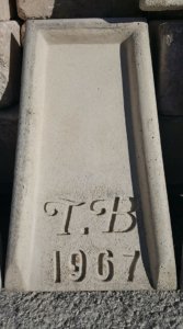 Custom precast splash bock with initials and year