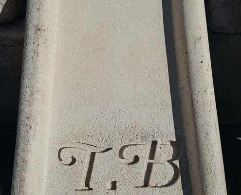 Custom precast splash bock with initials and year