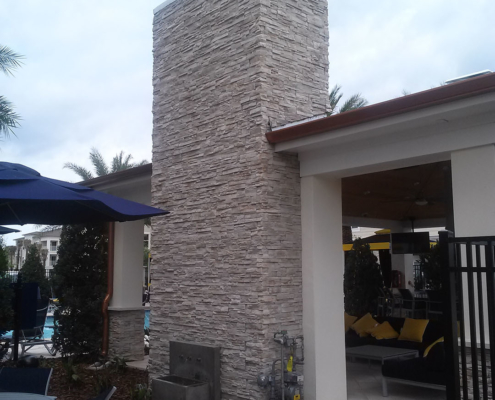 Exterior stone fireplace