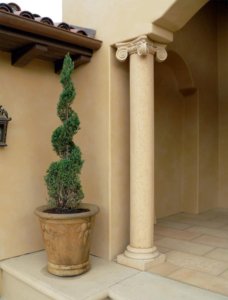 Precast concrete column with decorative cap