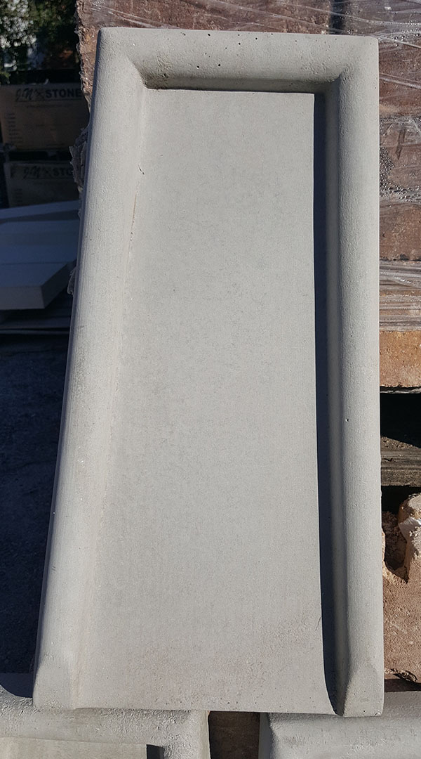 Precast stone splash block