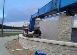 Stone veneer and precast wall cap installation - Twin Lakes - Winter Garden