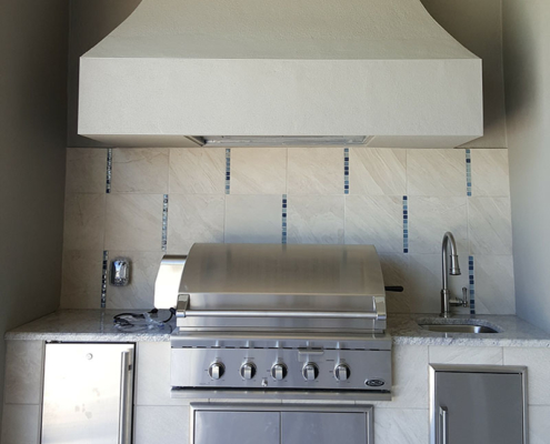 Summer kitchen with stucco splash