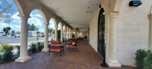 Breezeway with custom columns arches and cladding by Castle Group Construction